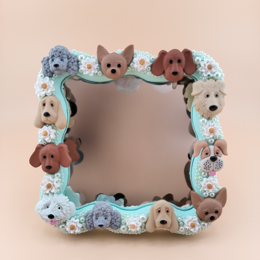 Decorative mirror with dog-themed design on a beige background